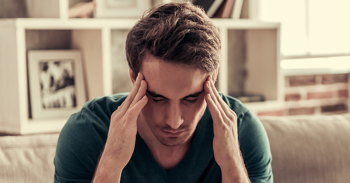 man-holding-head-og.jpg