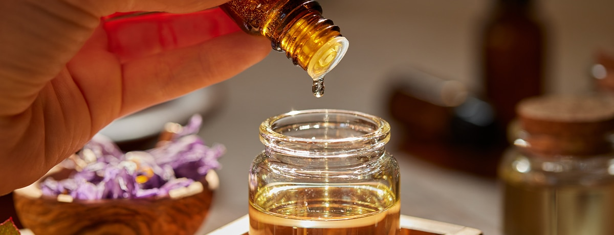 preparing-massage-oil-dropping-essential-woman.png