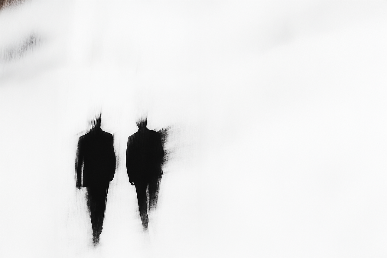 soochang5793_Two_blurry_figures_in_suits_walking_away_from_th_99efb539-59c4-4fc6-8ca0-0b06ed864146_3.png