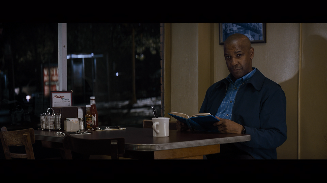 1568350-Denzel-Washington-Reading-The-Equalizer.png