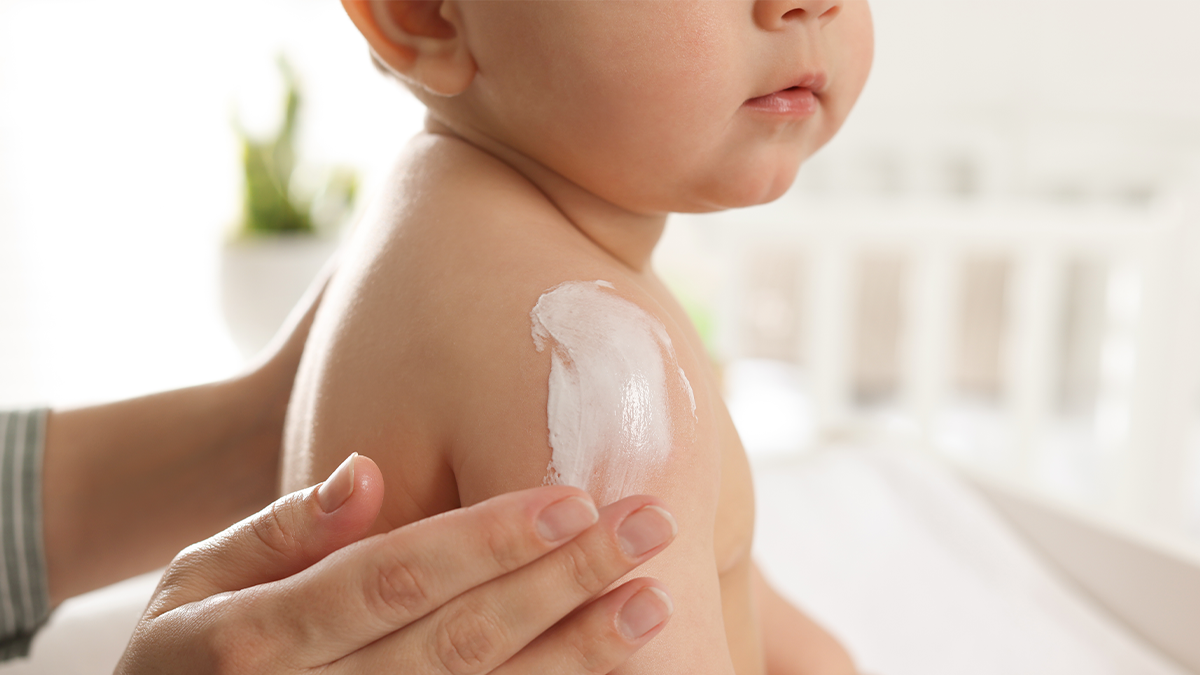 Applying Baby Moisturizer.png