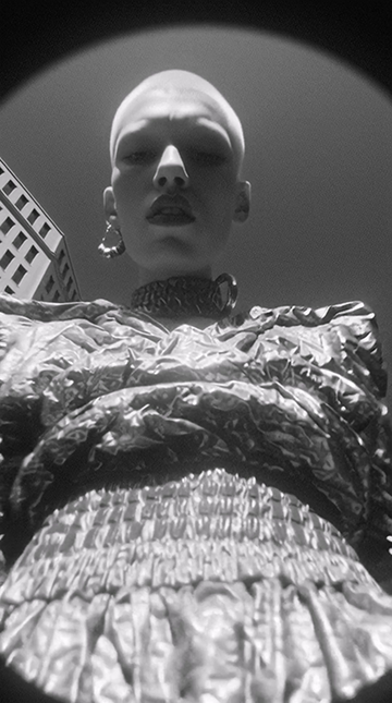 social_lovelovelove3_fisheye_lens_shot_of_a_stylish_human_bold_fashi_edd34084-ebd7-423d-9b0c-8459b7ff2bee_0 (1).mp4_20250709_193223.469.png