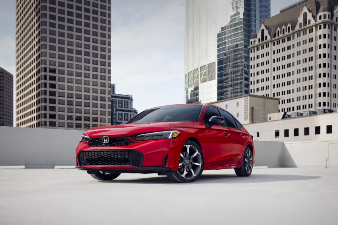 honda-civic-hybrid-red-exterior-city-background.png
