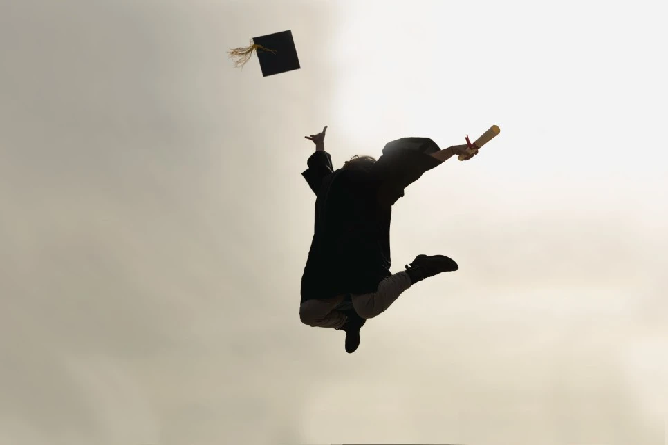 jumping-grad-student-celebrating.jpg?type=w966