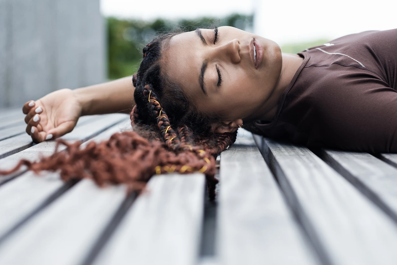 portrait-of-young-woman-lying-on-a-bench-2024-07-10-04-25-19-utc.JPG