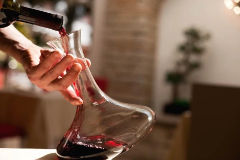 Decanting_red_wine_GettyImages-184140056_1920x1280.jpg?type=w1