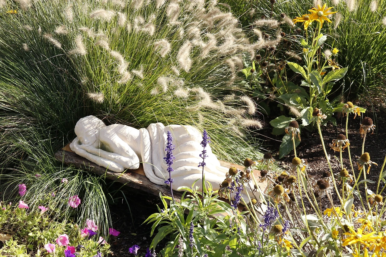 11.Elora Sculpture Project #16 Asleep in the Garden.JPG