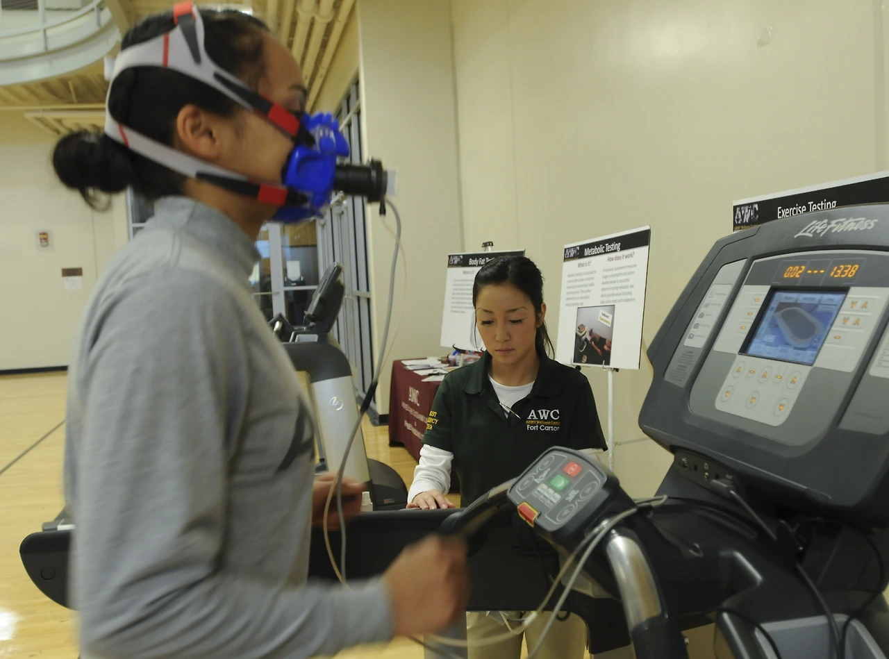 U.S._Army_Spc._Alejandra_Herrera,_left,_a_mechanic_with_the_7th_Squadron,_10th_Cavalry_Regiment,_1st_Brigade_Combat_Team,_4th_Infantry_Division,_runs_on_a_treadmill_during_the_VO2_Max_competition,_which_130306-A-UK001-036.jpg