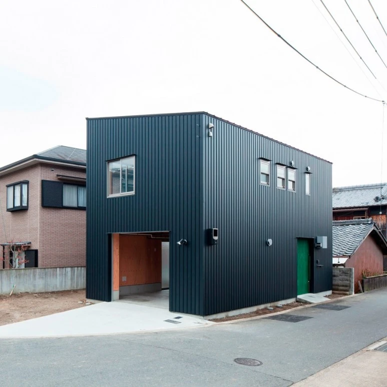 exotic-black-wall-japan-small-house-design-can-be-combined-with-grey-floor-brings-modern-touch-of-the-house-design-ideas-with-green-door-that-make-it-seems-nice.jpg?type=w773