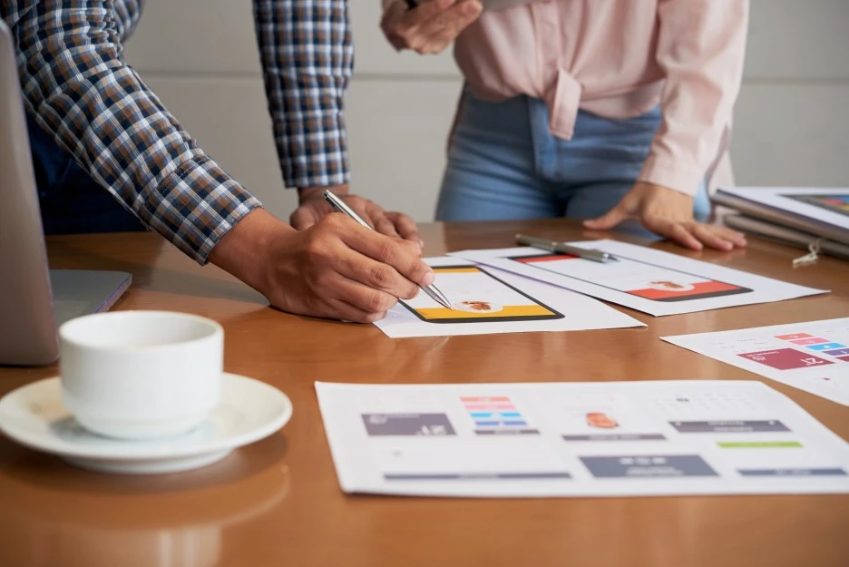 cropped-front-end-developers-designing-mobile-application-interface.jpg?type=w1