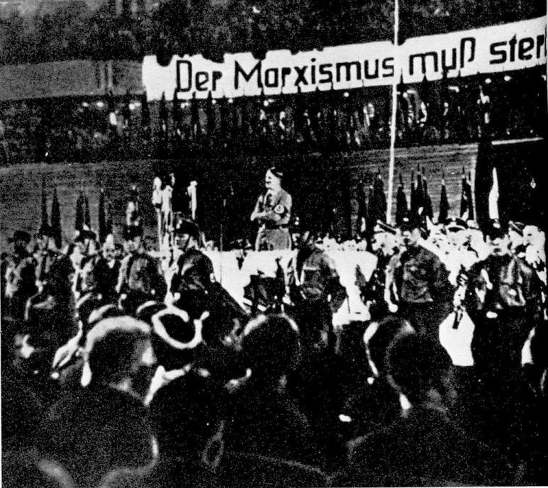 1024px-Hitler_na_wiecu_%28Historia_str.238%29.jpg?type=w773