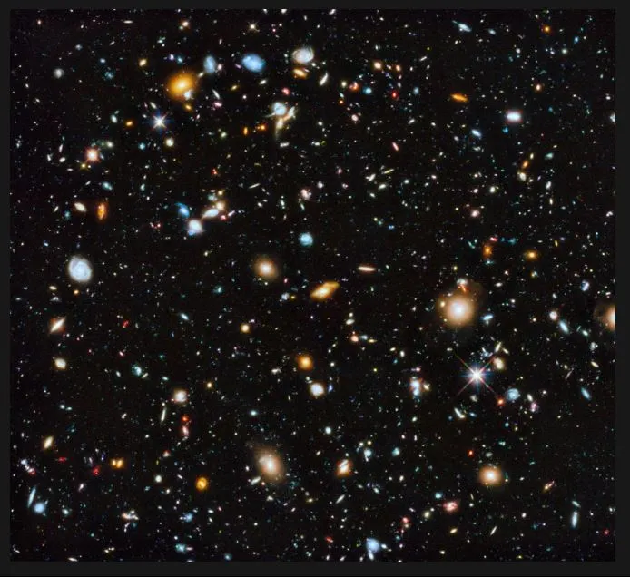 Astronomers using the Hubble Space Telescope have captured the most comprehensive picture ever assembled of the evolving universe and one of the most colourful..JPG