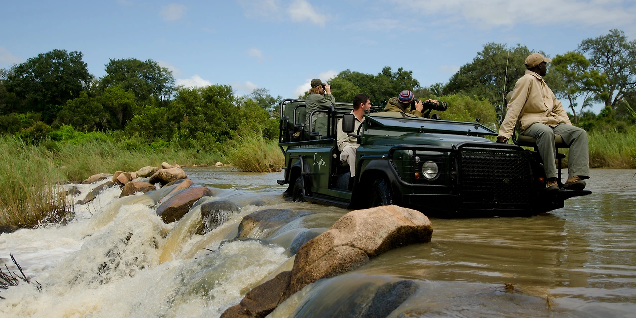 singita-boulders-lodge-game-drive4.jpg?width=2048&height=1024&format=jpg&v=1da5e11b079acb0