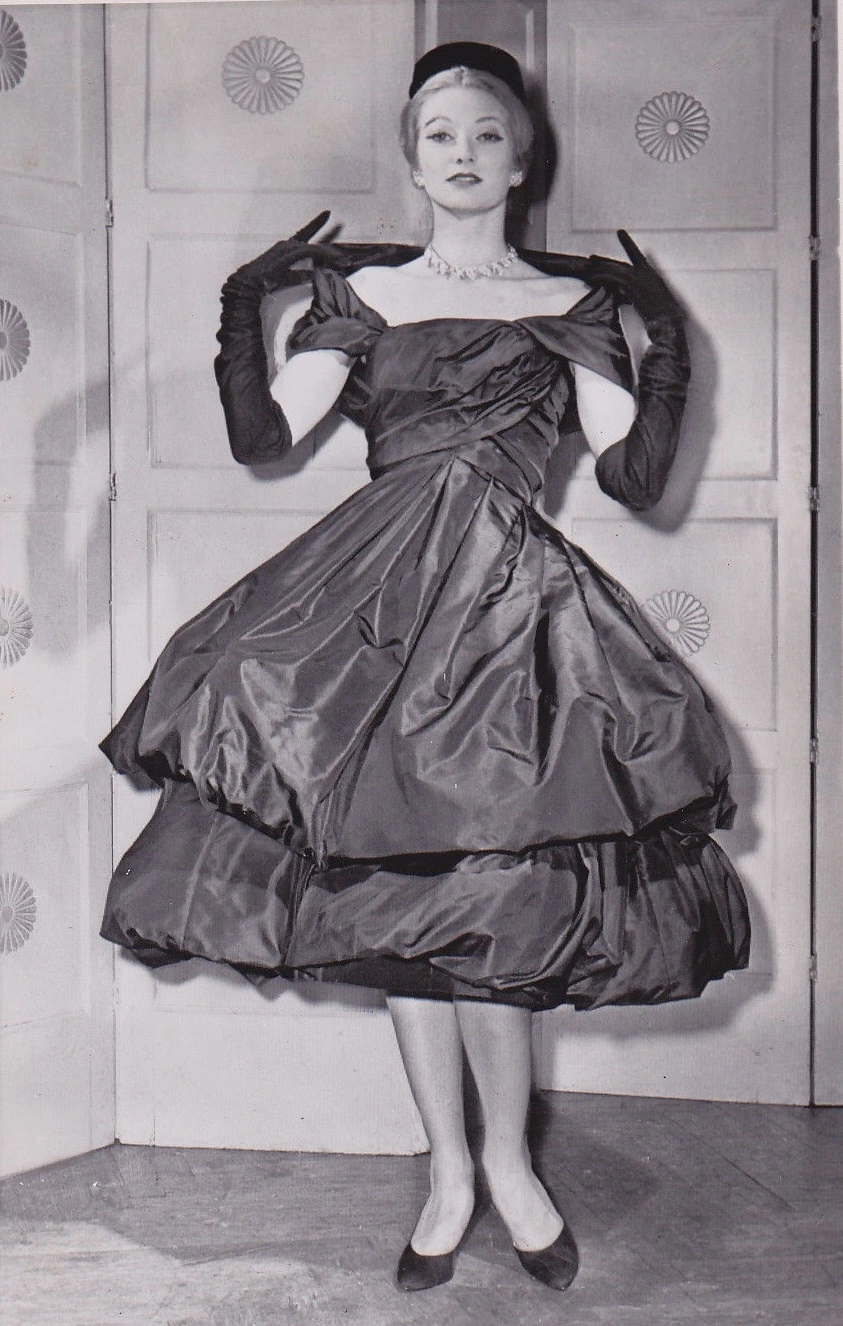 July_1959_Yves_Saint_Laurent_for_Christian_Dior_black_taffeta_late_day_dress.jpg?type=w1