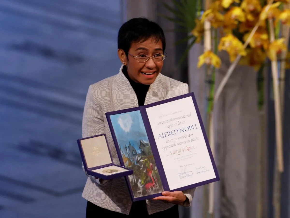 maria-ressa-nobel-prize-ceremony-GettyImages-1237139286.jpg?resize=1200,900