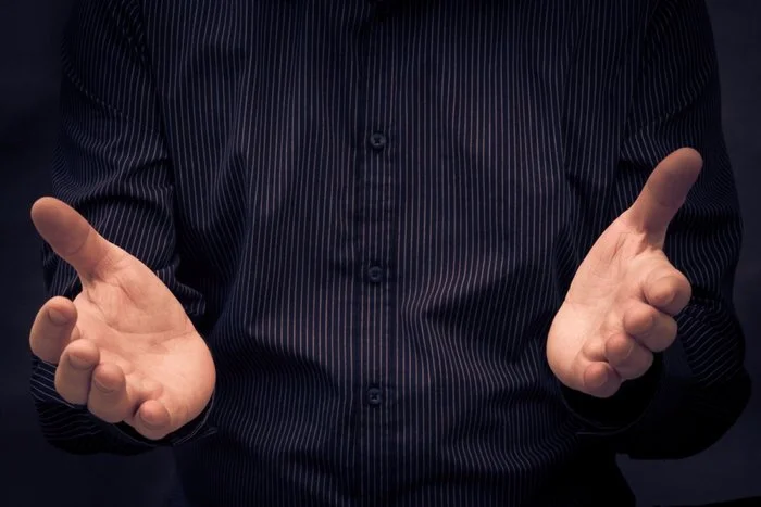 20150619164449-be-more-persuasive-work-man-hands.jpeg?width=700&amp;crop=2:1