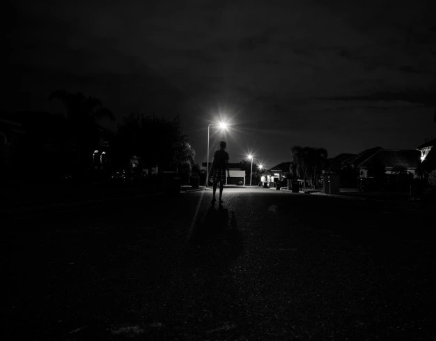 boy-walking-alone-night-street-lights_1353-11.jpg?size=626&ext=jpg
