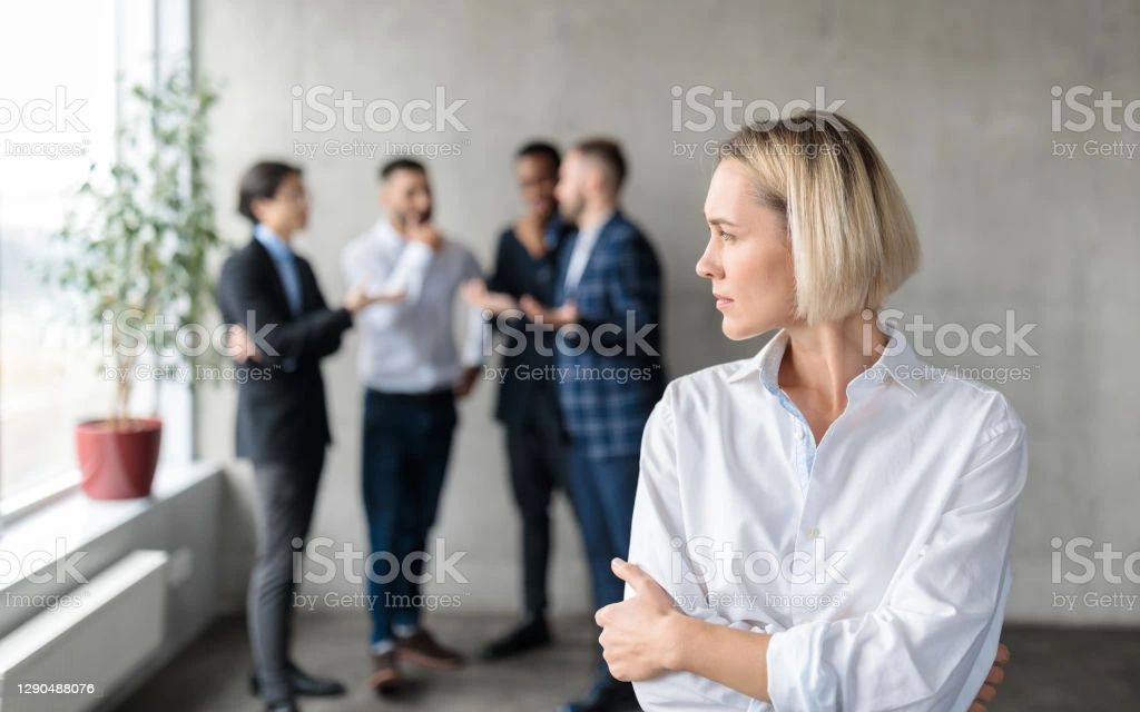 male-coworkers-whispering-behind-back-of-unhappy-businesswoman-in-picture-id1290488076?b=1&amp;k=20&amp;m=1290488076&amp;s=170667a&amp;w=0&amp;h=aZy4ZMdrllqXyN-r2-ZCQWa7r9Un1FHpRcnhFs-WY50=