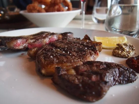 rib-eye-served-with-just.jpg?type=w773