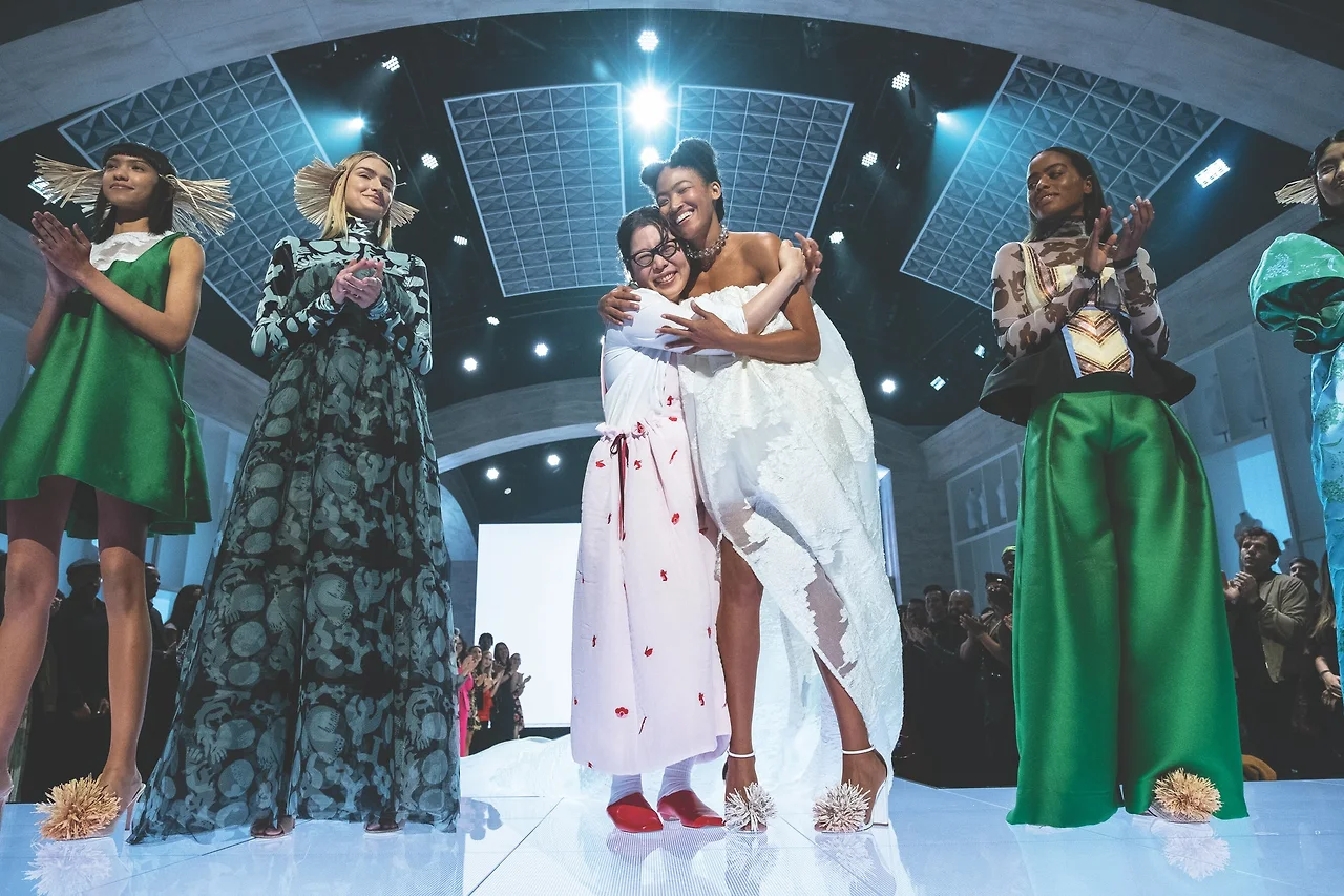 1606651288937055-Winner-Next-in-Fashion-Minju-Kim-with-models.jpg?w=1900&fit=crop&crop=faces&auto=%5B%22format%22%2C%20%22compress%22%5D&cs=srgb