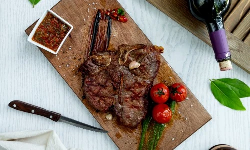 ?src=%22https%3A%2F%2Fwww.millikensreef.com%2Fwp-content%2Fuploads%2F2023%2F04%2Flamb-steak-served-with-sauce-grilled-tomatoes.jpg%22&type=ff500_300