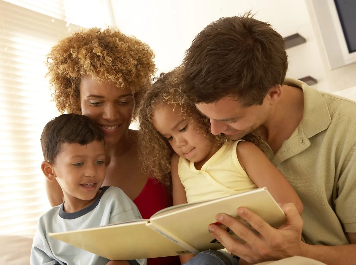 mixed-race-family-reading.jpg?type=w1200