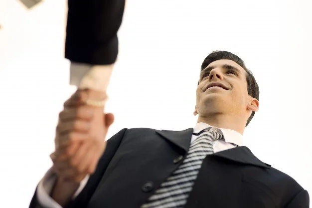 close-up-of-manager-shaking-hands_1139-439.jpg?type=w1200