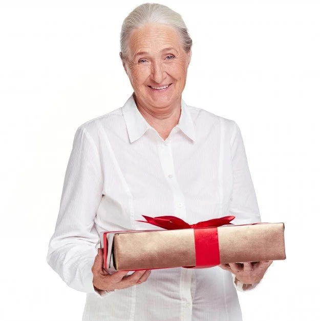senior-woman-holding-a-gift-with-a-red-bow_1098-3440.jpg?type=w1200