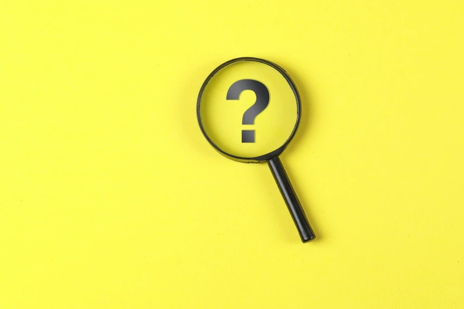 business-financial-concept-with-magnifying-glass-question-mark-yellow-backgr.jpg?type=w1