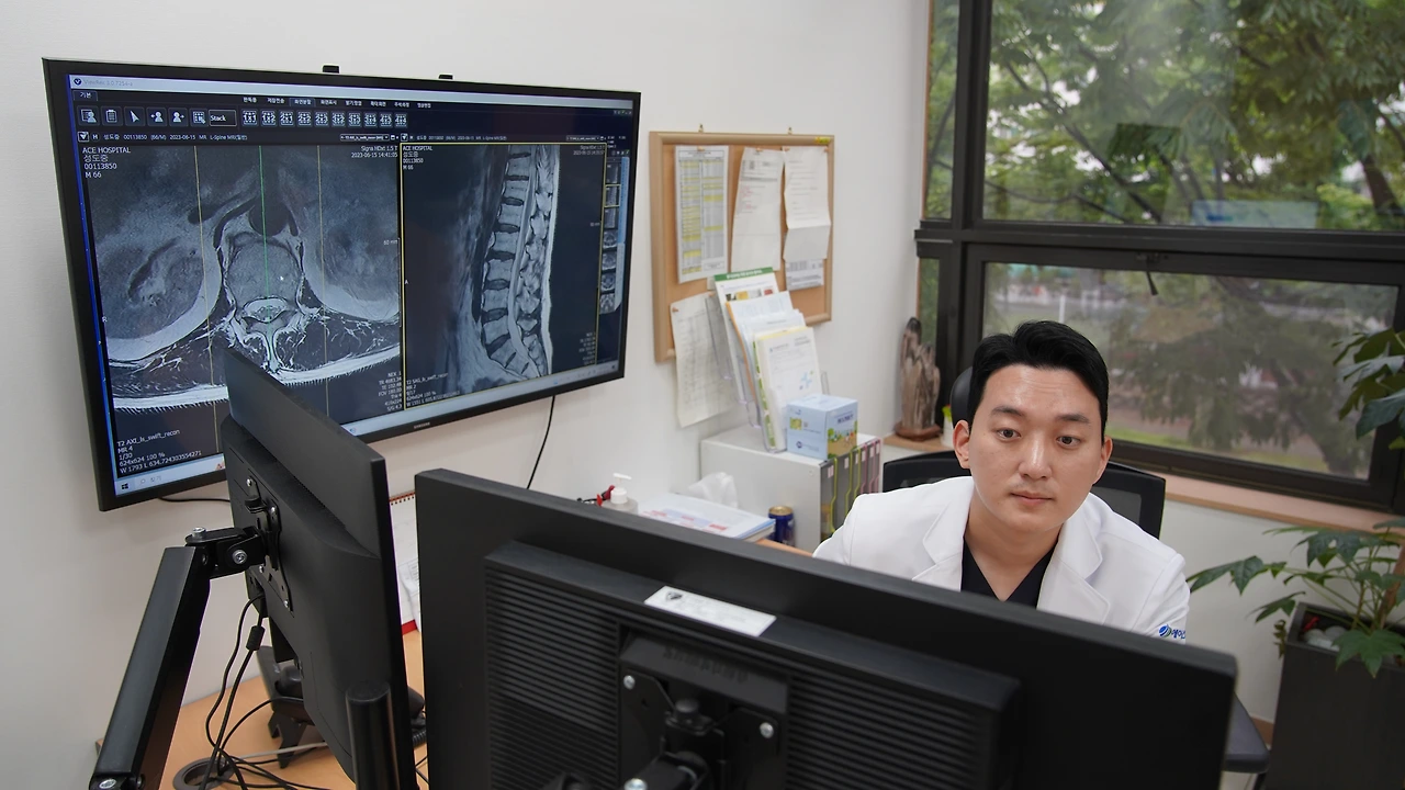 강병직원장님 진료 8.JPG