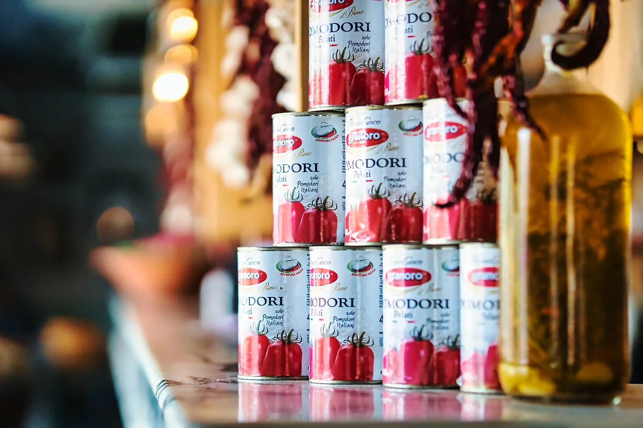 photo-1600157514707-694f4c8f1557?ixlib=rb-4.0.3&amp;ixid=MnwxMjA3fDB8MHxzZWFyY2h8MTZ8fGNhbiUyMHRvbWF0b3xlbnwwfHwwfHw%3D&amp;w=1000&amp;q=80