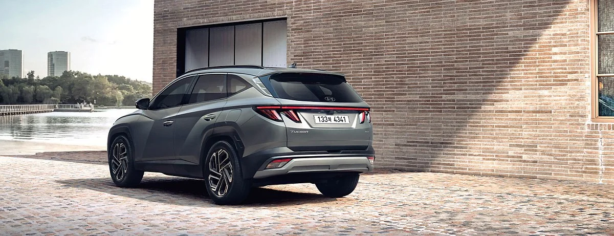 the_new_tucson_hybrid_gallery_exterior_rear_side_view.jpg?type=w1200