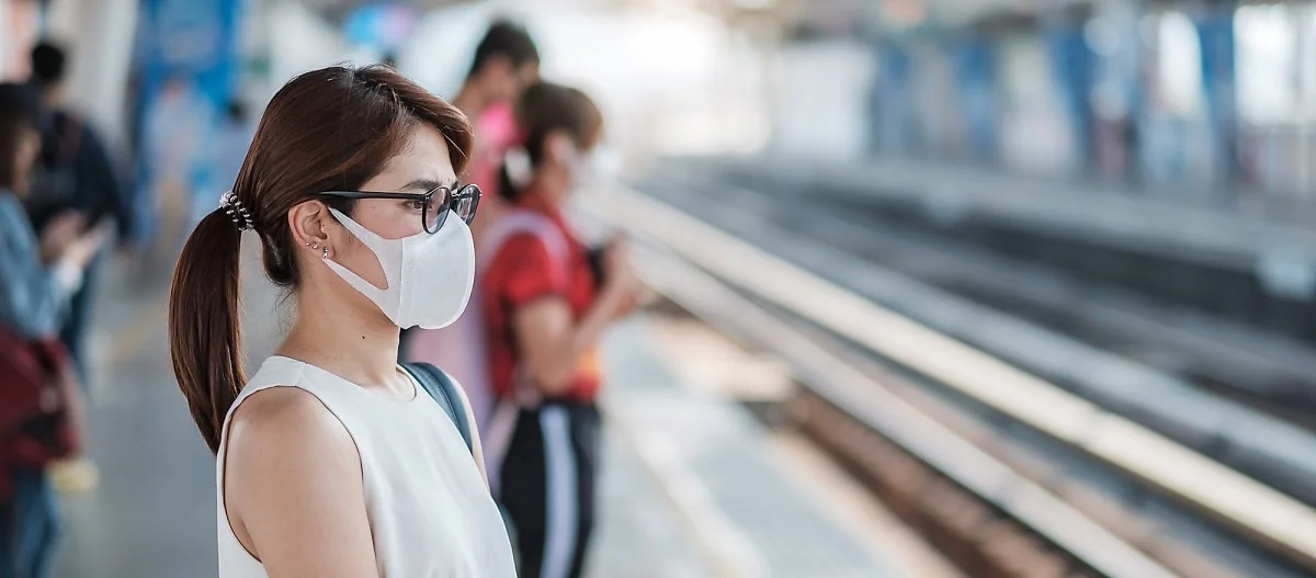 young-asian-woman-wearing-protection-mask-against-novel-coronavirus-2019-ncov-wuhan-coronavirus-public-train-station-is-contagious-virus-that-causes-respiratory-infection-healthcare-concept.jpg?type=w1200