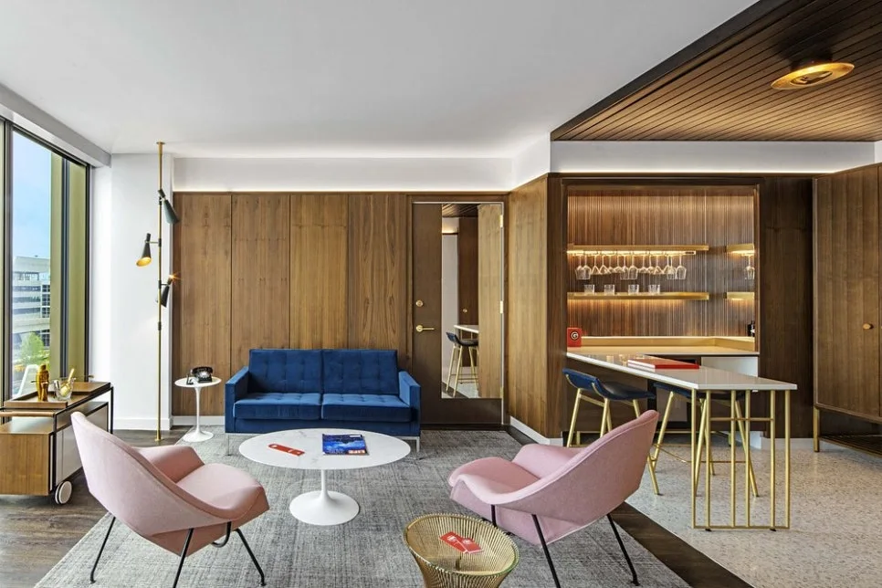 eero-saarinen-suite-sitting.jpg?type=w966