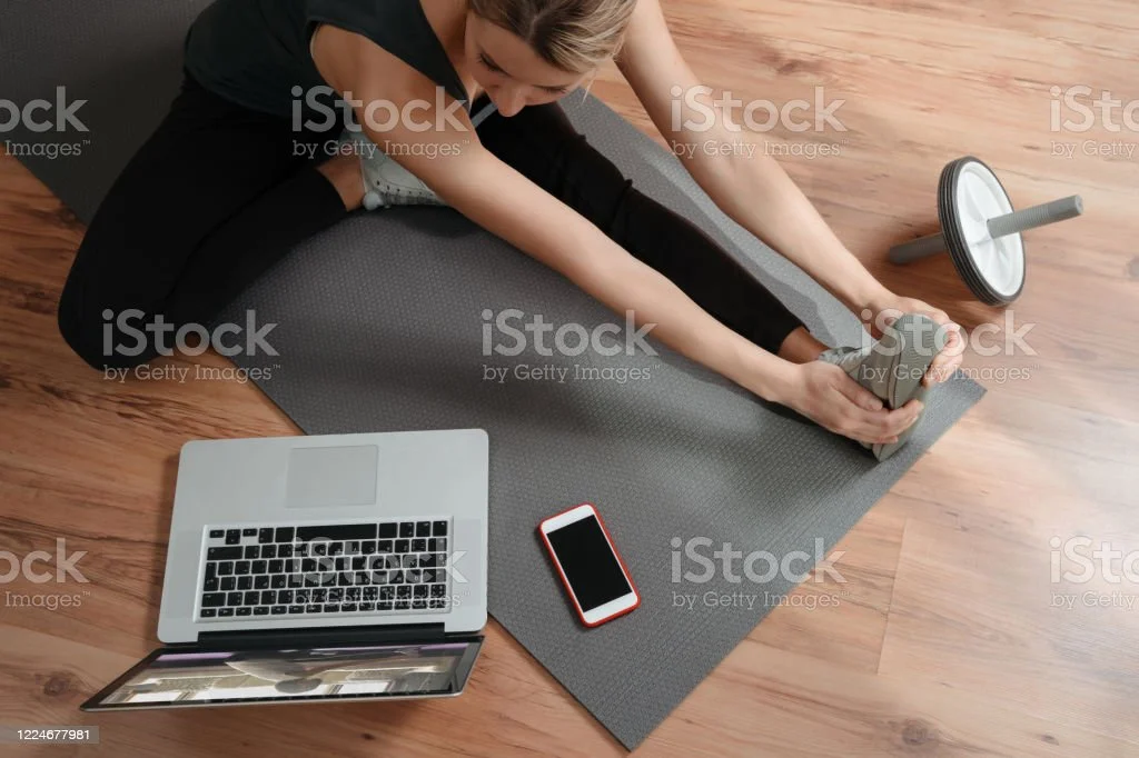 sporty-flexible-woman-doing-workout-or-yoga-online-picture-id1224677981?k=20&amp;m=1224677981&amp;s=612x612&amp;w=0&amp;h=YjexlgeN2ICEJW0u50c8I-lg6n5ytVZeeQYbJrNcgkY=