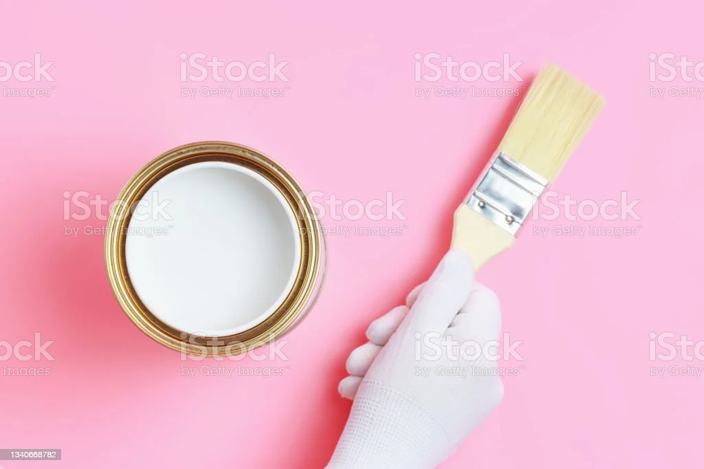 hand-in-glove-holds-paintbrush-over-open-can-of-white-paint-on-pink-picture-id1340668782?b=1&amp;k=20&amp;m=1340668782&amp;s=170667a&amp;w=0&amp;h=MyvpHLYXQfXWjIYjOjGxDvvnNO9pe1PXDPEjoS3wmag=