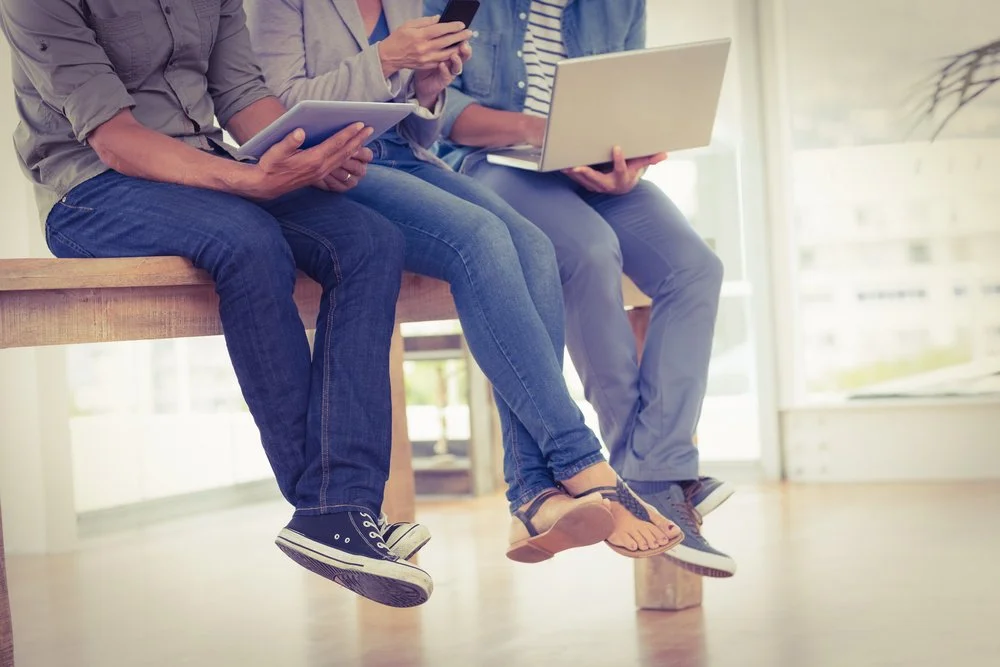 Three%20creative%20business%20team%20working%20on%20electronic%20devices%20in%20the%20office.jpeg?t=1533275073598