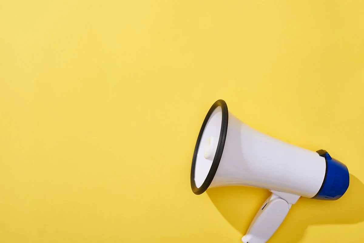 top-view-of-loudspeaker-on-yellow-background-with--PBMHSEC.jpg?type=w1200