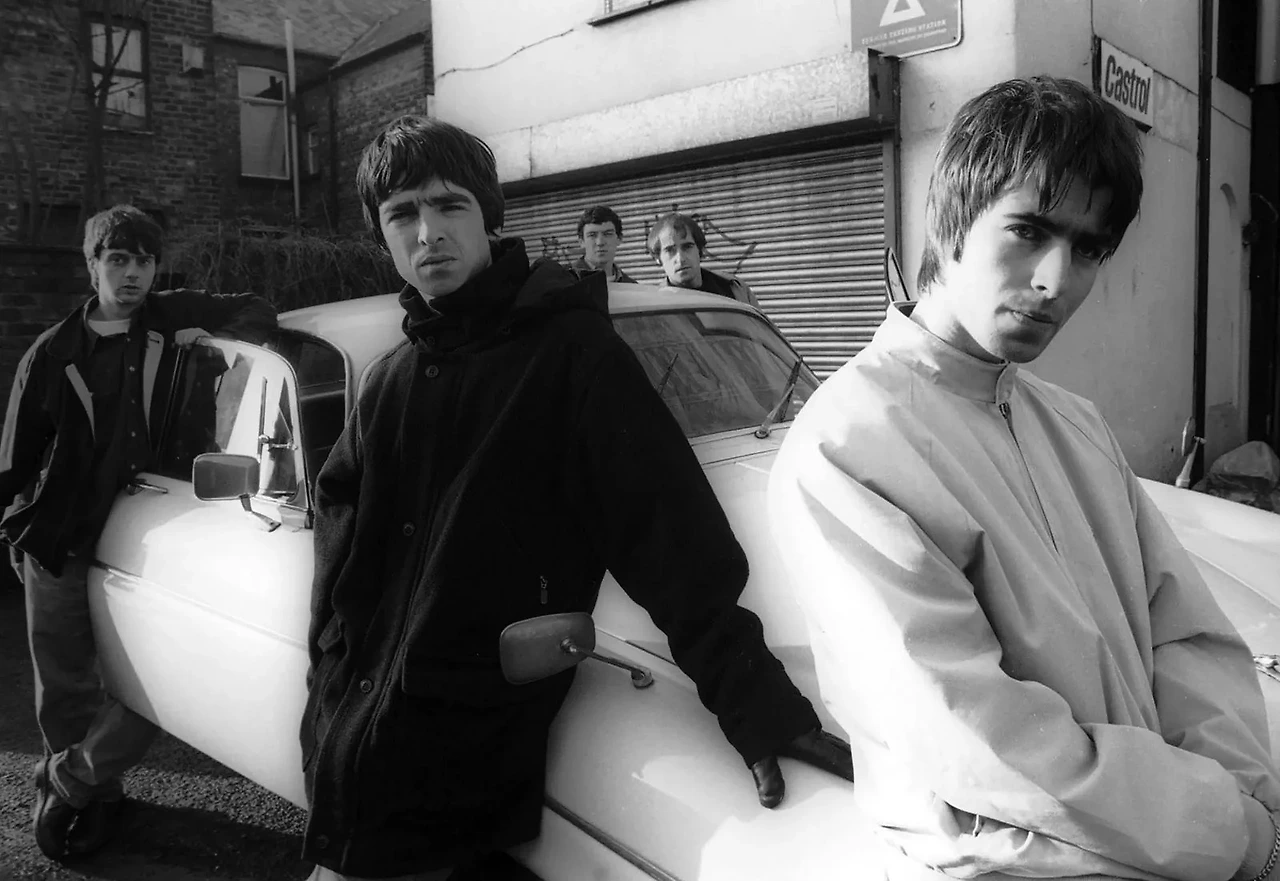 Rock-band-oasis-Liam-Noah-Gallagher-Paul-Arthurs-Tony-McCarroll-Paul-Mcguigan-1993 (1).jpeg
