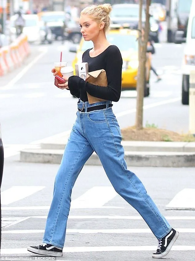 Elsa_Hosk_highlights_waist_in_bodysuit_and_belted_denim_in_NYC.jpg?type=w1200