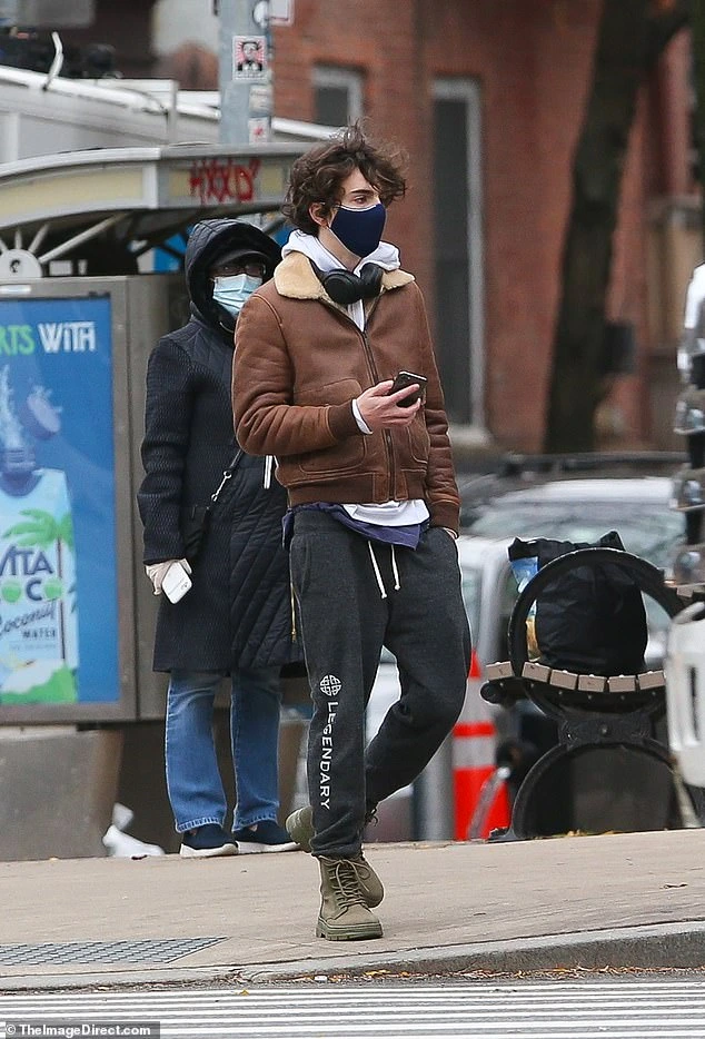 Timothee_Chalamet_leaves_SoHo%27s_New_Museum_in_sweatpants_and_hoodie.png?type=w1200