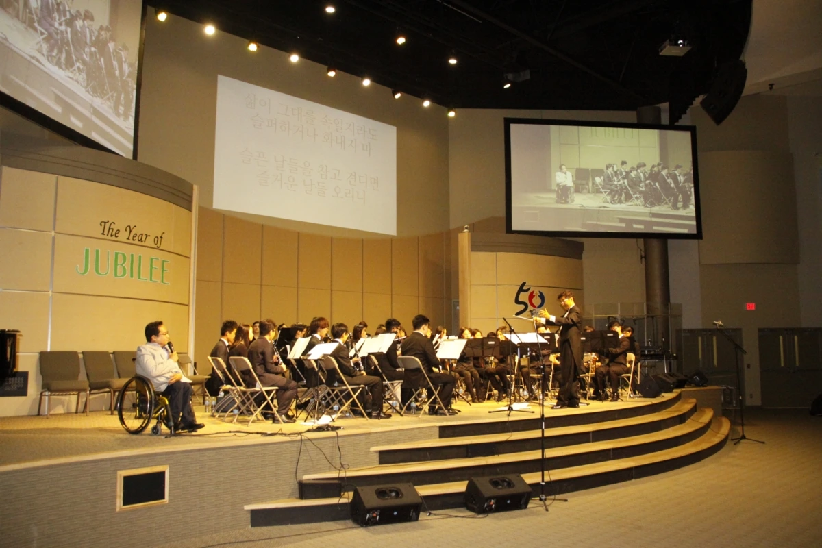 유홍선_공동체 창립 20주년 음악회.jpeg