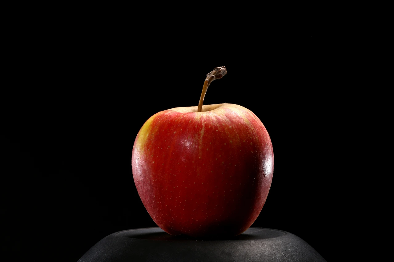 close-up-of-red-organic-fresh-apple-on-black-backg-2023-11-27-05-01-57-utc.JPG