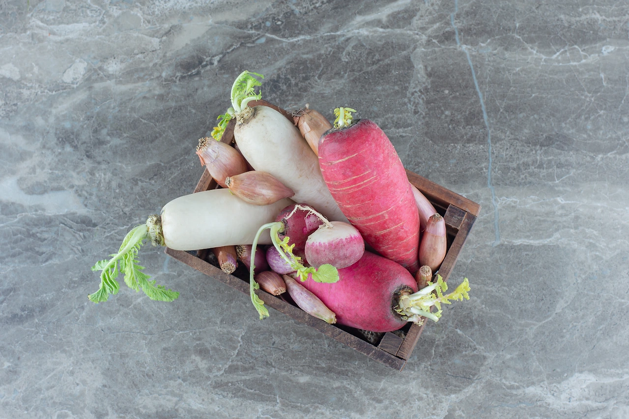 red-and-white-radishes-in-the-box-on-the-marble-b-2023-11-27-05-19-30-utc.JPG