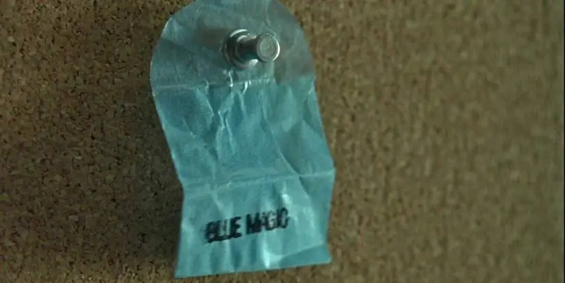 a-pouch-of-blue-magic-heroin-pinned-on-a-board-in-american-gangster.jpg?q=50&fit=crop&w=825&dpr=1.5