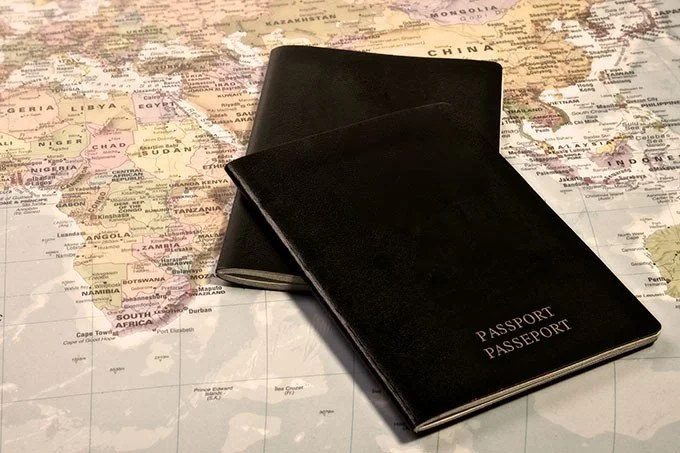 passport-with-map-in-the-background.jpg?type=w1200