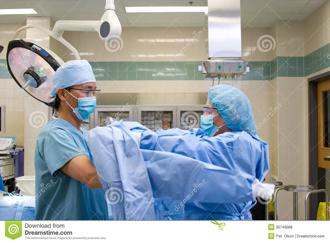 doctor-gowning-surgery-putting-gown-help-nurse-35740068.jpeg