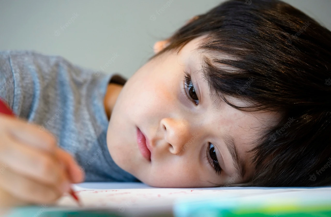selctive-focus-lonely-child-boy-lying-head-down-table-with-sad-face-emotional-portrait-five-years-old-kid-bored-with-school-homework-spoiled-child_39190-213.jpg?w=2000