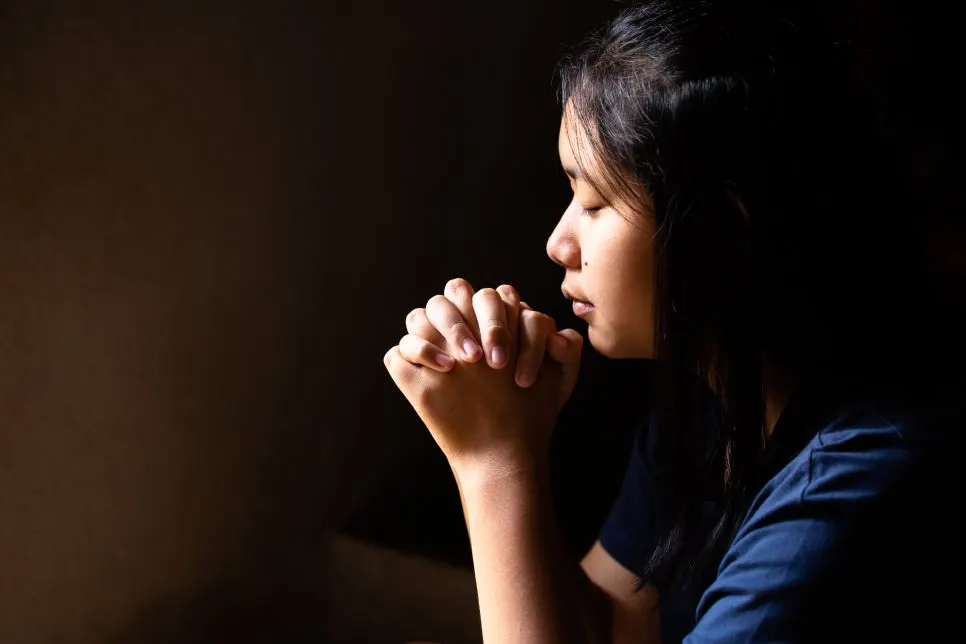 girl-praying-with-her-eyes-closed.jpg?type=w966