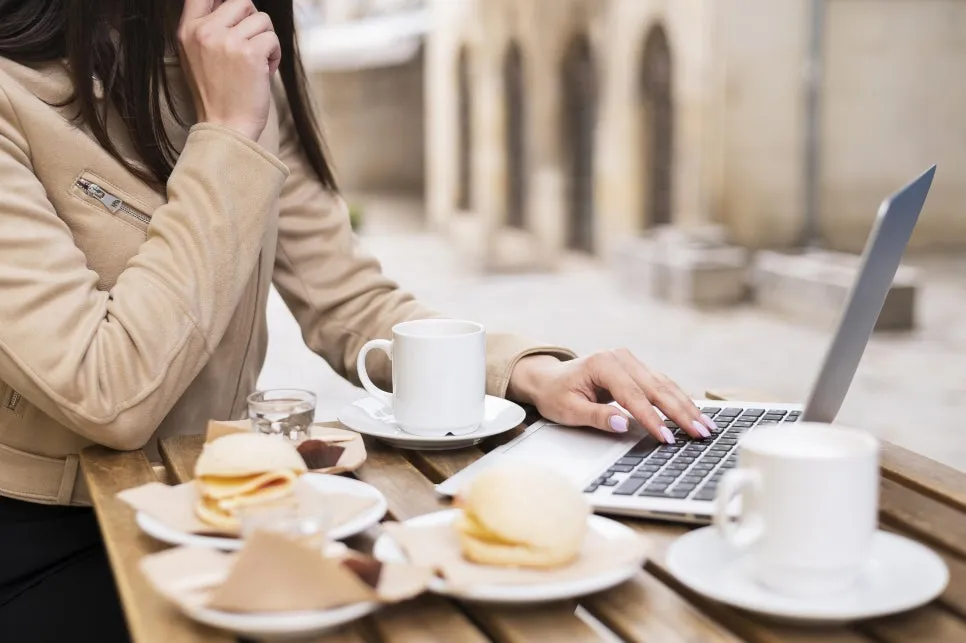 side-view-woman-working-outdoors-having-lunch.jpg?type=w966